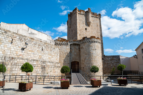 Castillo de Coria con nubes en cielo azul. Coria, Cáceres, Extremadura, Spain. © Pablo