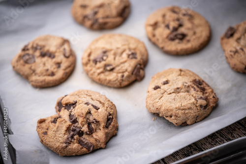 traditional chocolate chip cookie on cooking pan