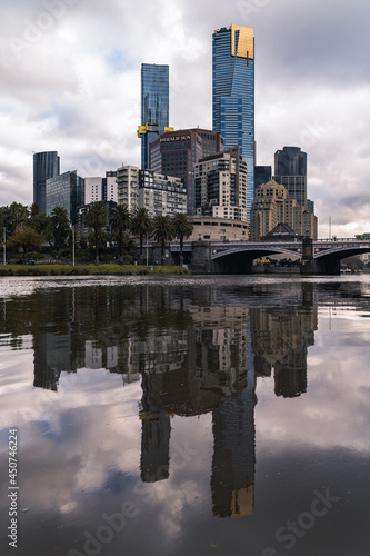 Reflective photo of Melbourne cbd during a cloudy day