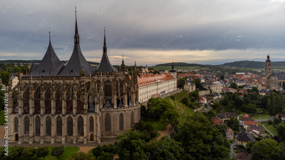 Fototapeta premium Aerial Kutna Hora town cityscape, vineyard, gothic church of St. Barbara