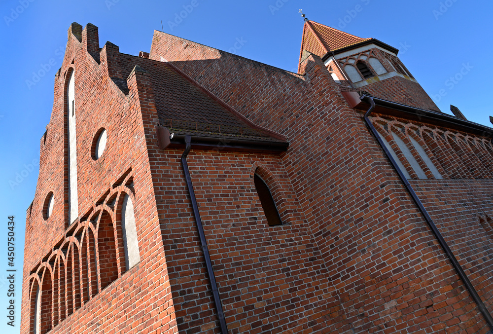 Built in 1904, the Catholic Church of M.B. Gromniczna in the village of Wiśniowo Ełckie in Masuria, Poland. The photos show architectural details and a general view of the temple.