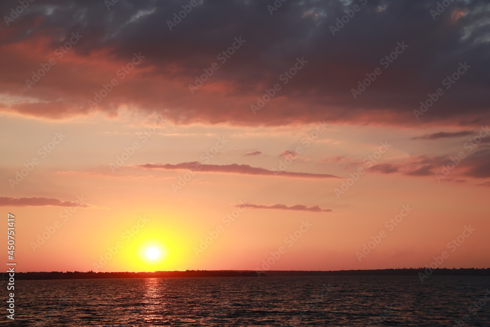 Picturesque view of beautiful sunset on riverside Picturesque view of beautiful sunset on riverside