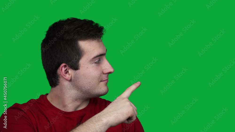 guy on the green screen points his finger to the side guy on the green screen points his finger to the side