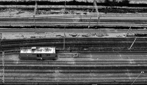 Black and white photo of CPTM rails aligned horizontally at Barra Funda railway terminal, Sao Paulo, Brazil photo