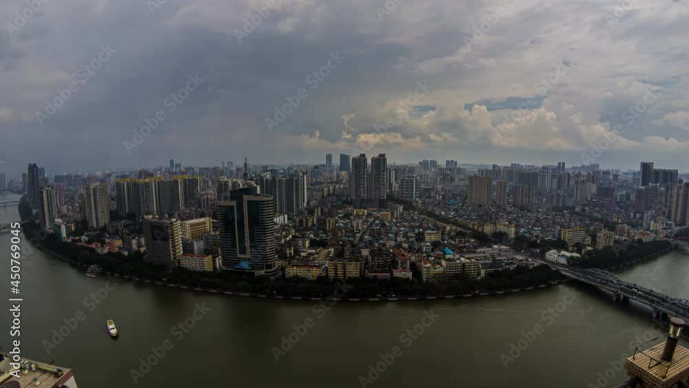 Day timelapse of rainstorm over huge metropolis. Moving storm clouds and sun over large modern city in China. Populous river city cloudy rainfall daytime. Day timelapse of rainstorm over huge metropolis. Moving storm clouds and sun over large modern city in China. Populous river city cloudy rainfall daytime.