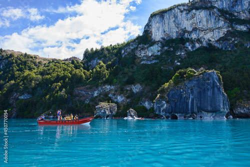 Tourist boat exploring the surreal Marble Caves (Capilla de Mármol), Rio Tranquilo, Aysen, Patagonia, Chile photo