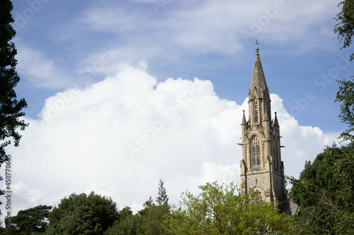 Beautiful view of the historical Llandaff Cathedral against the cloudy blue sky in Cardiff, Wales photo