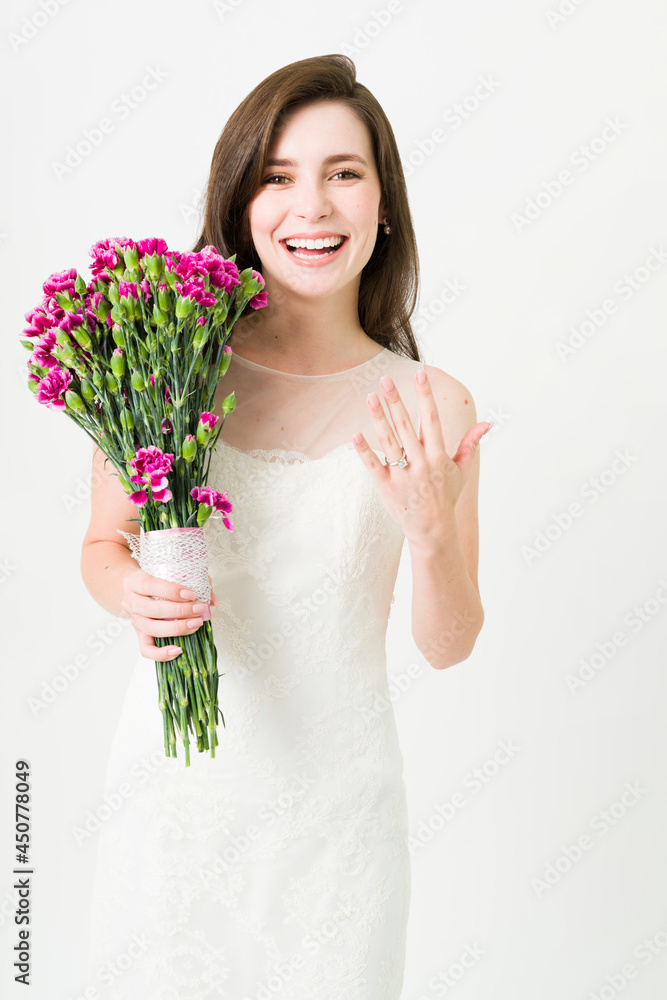 Gorgeous bride showing her diamond ring Gorgeous bride showing her diamond ring