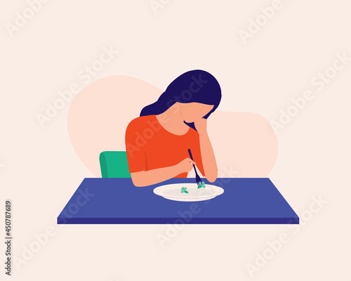 Young Depressed Woman Not Feeling Hungry And Just Eating Broccoli For Meal. Eating Disorder. photo