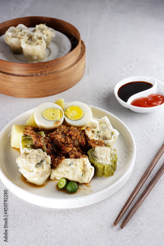Siomay a dumpling traditional Indonesian food with peanut sauce. 
