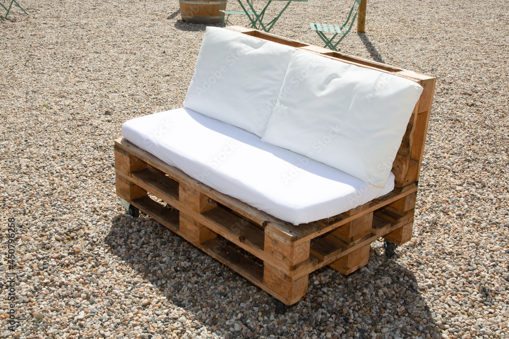 wooden pallets and white cushions make garden wood lounge chair in home  garden outdoor Stock Photo | Adobe Stock