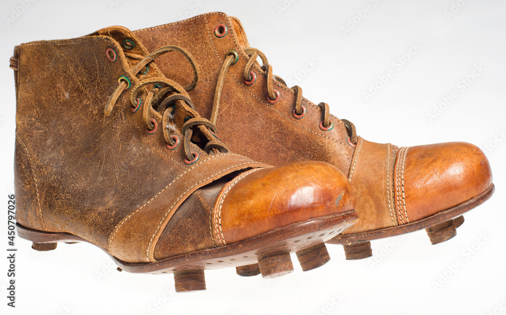 old worn football boots boots Stock Photo | Adobe Stock