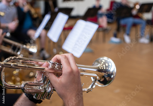 person playing the trumpet in a school band