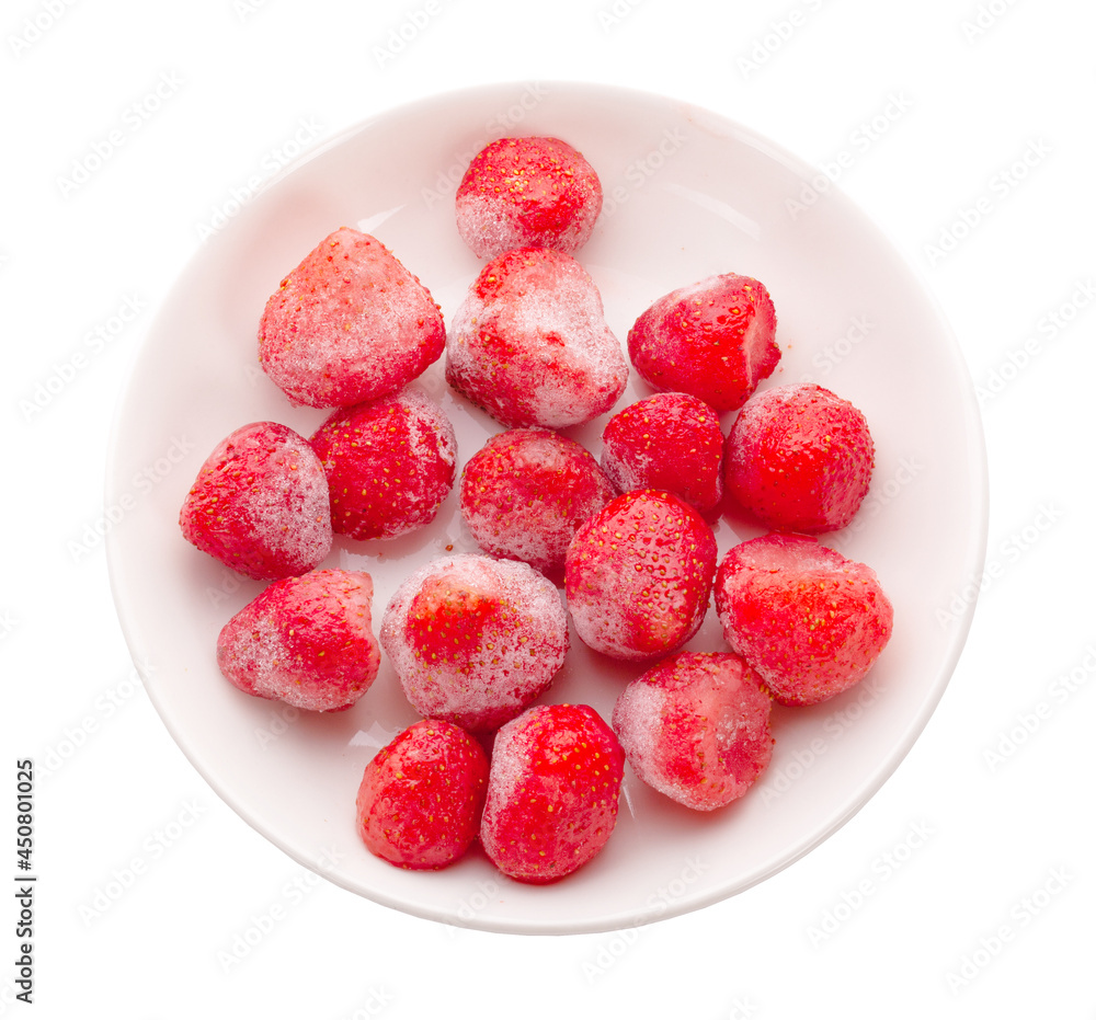 Frozen strawberries on the dish. Top view Frozen strawberries on the dish. Top view