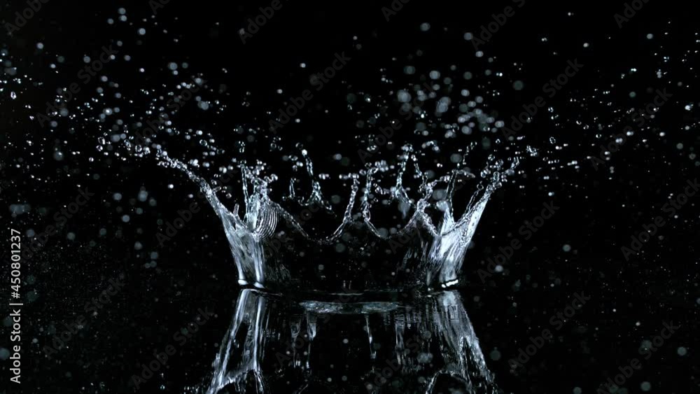 Super Slow Motion Shot of Water Crown Splash at 1000fps Isolated on Black Background. Super Slow Motion Shot of Water Crown Splash at 1000fps Isolated on Black Background.
