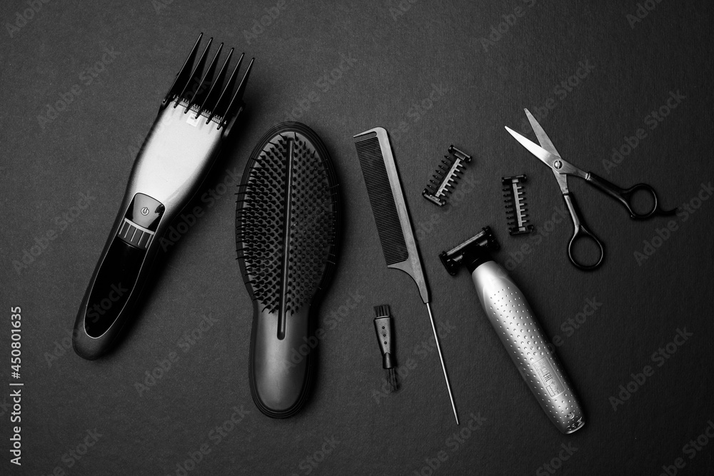 Fototapeta premium Equipment, tools for barber salon on black background