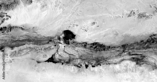 the black dog,  Black and white photo, abstract photography of landscapes of the deserts of Africa from the air,