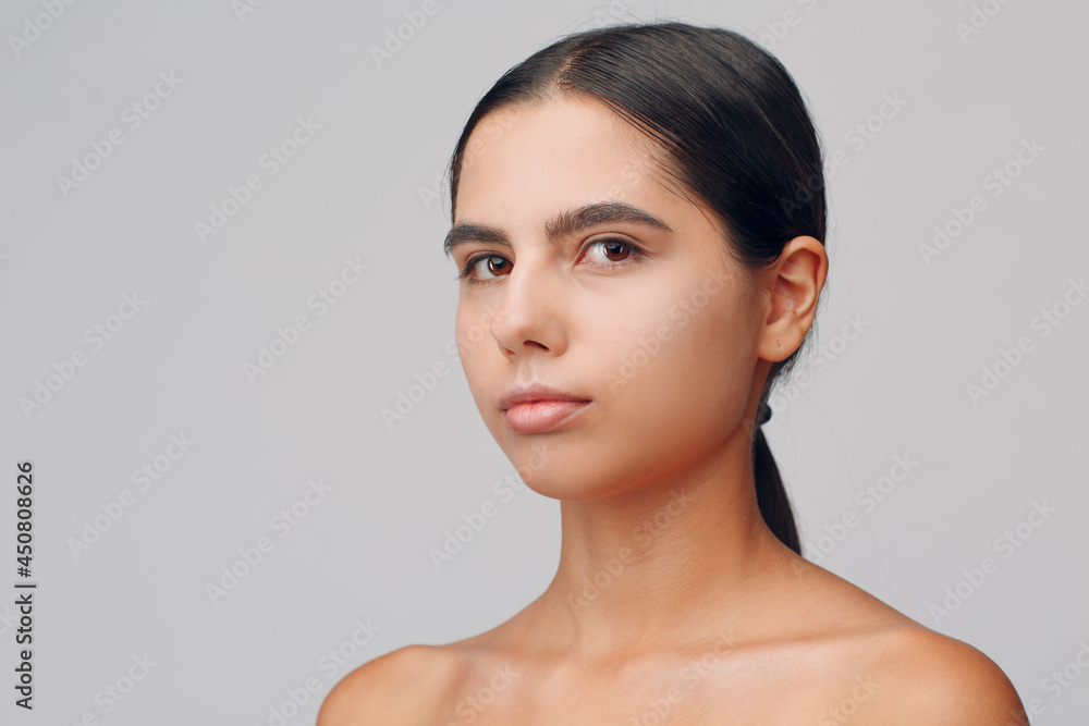 Portrait of young beautiful positive woman with nude make up Portrait of young beautiful positive woman with nude make up