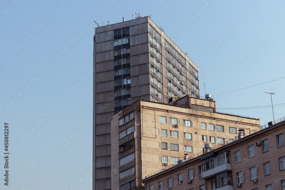 Row of the buildings in Moscow city Russia, soviet architecture, urban exterior, apartment buildings.