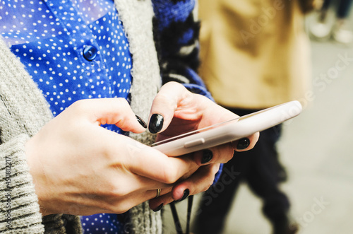 Young woman using mobile phone. Using technology
