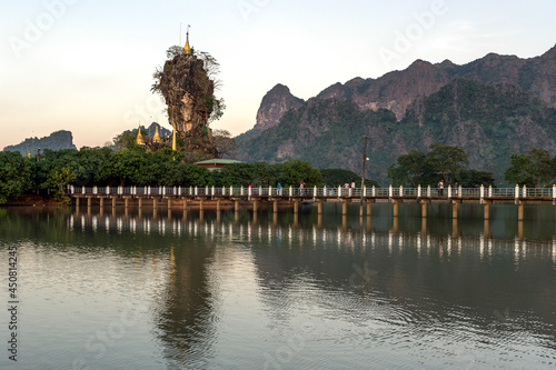 Myanmar (formerly Burma). Kayin State (Karen State). Hpa Han. Kyauk Kalap or Kyaik Ka Lat monastery at dusk photo