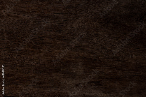 Foto Dark brown wood and uneven surfaces for texture and copy space in background