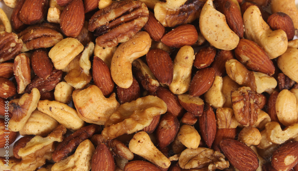 Organic Almonds Walnuts and Cashews Mixed Nuts Closeup Organic Almonds Walnuts and Cashews Mixed Nuts Closeup