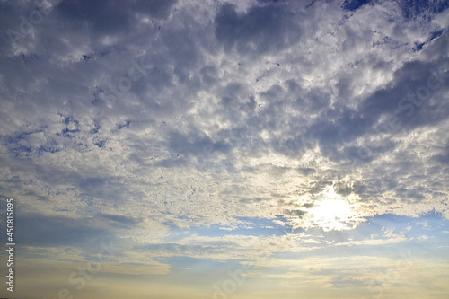 Translucent clouds obscure the sun.