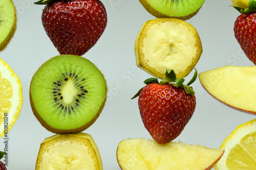 Fototapeta Naklejka Na Ścianę i Meble -  Set of different fruits. Banana, strawberry, kiwi, lemon and apple
