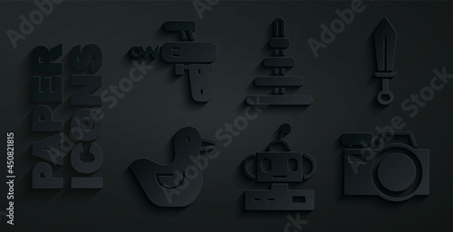 Set Robot toy, Sword, Rubber duck, Photo camera, Pyramid and Ray gun icon. Vector