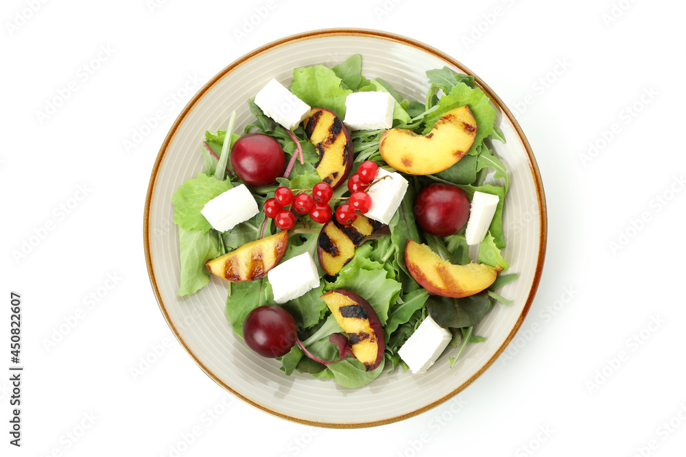 Salad with grilled peach isolated on white background