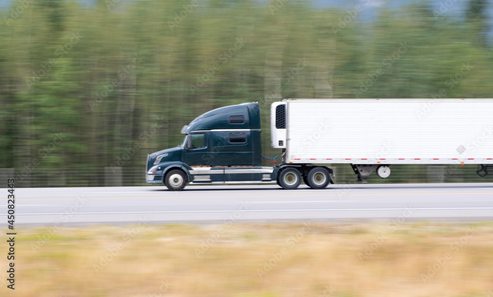 Heavy Cargo on the Road. A truck hauling freight along a highway