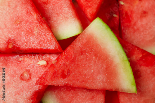 Canvas Print Ripe juicy watermelon slices all over background