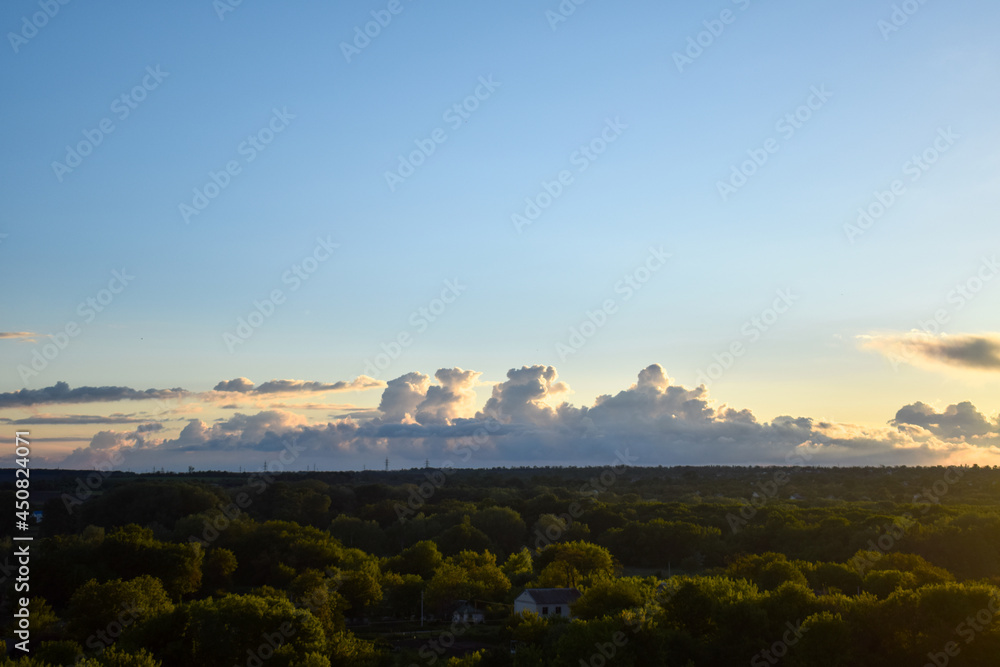 Evening clouds over landscape
