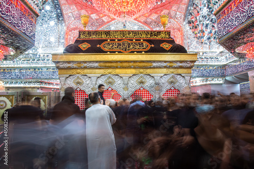 imam Hussain shrine surrounded by visitors 