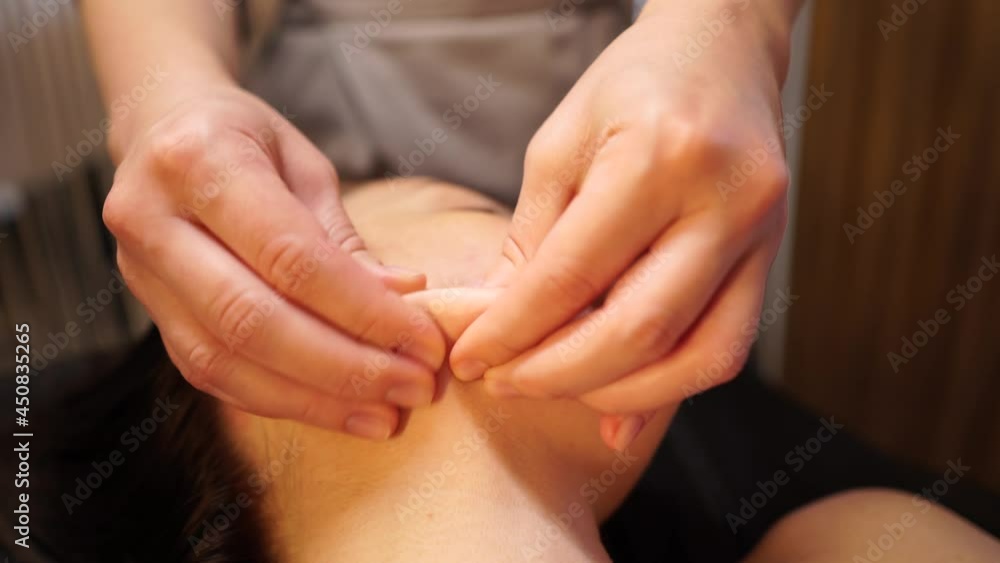 Female facial massage. Female facial massage.