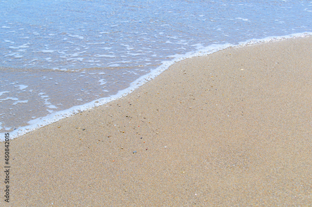Texture of sand with an edge of sea-wave foam. Texture of sand with an edge of sea-wave foam.