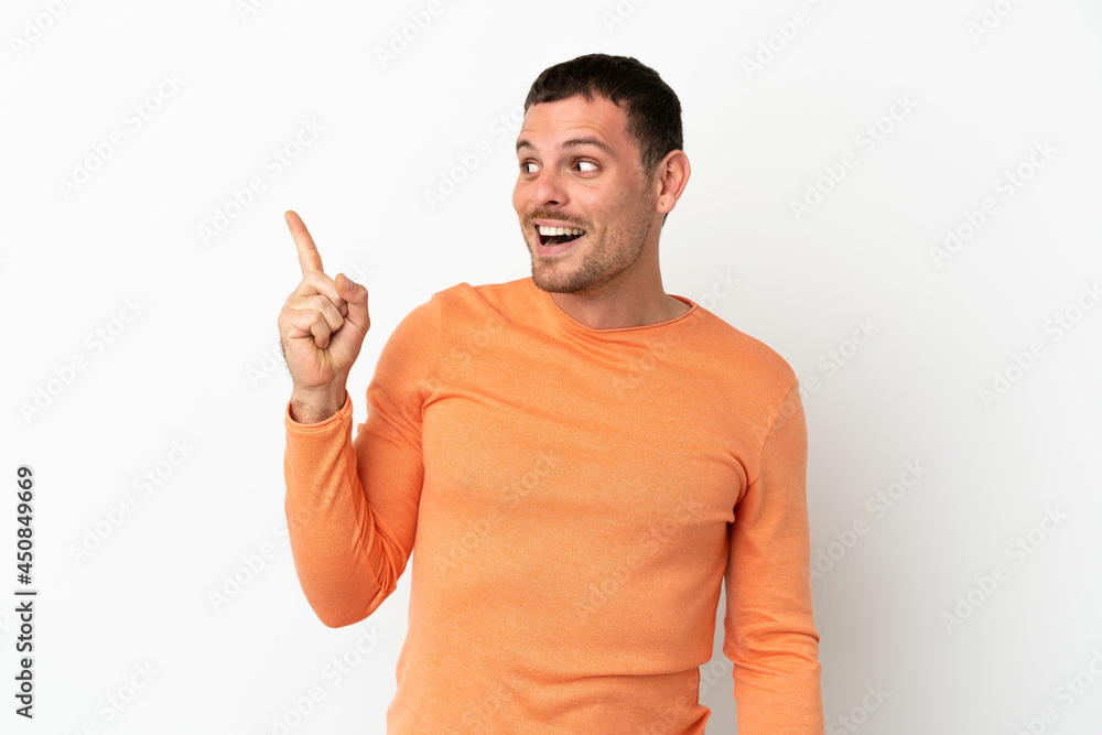 Fototapeta premium Brazilian man over isolated white background intending to realizes the solution while lifting a finger up