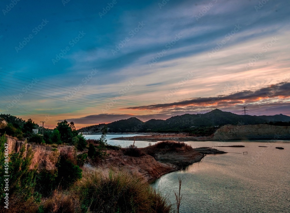 The Amadorio reservoir, near Alicante in Spain, at sunset