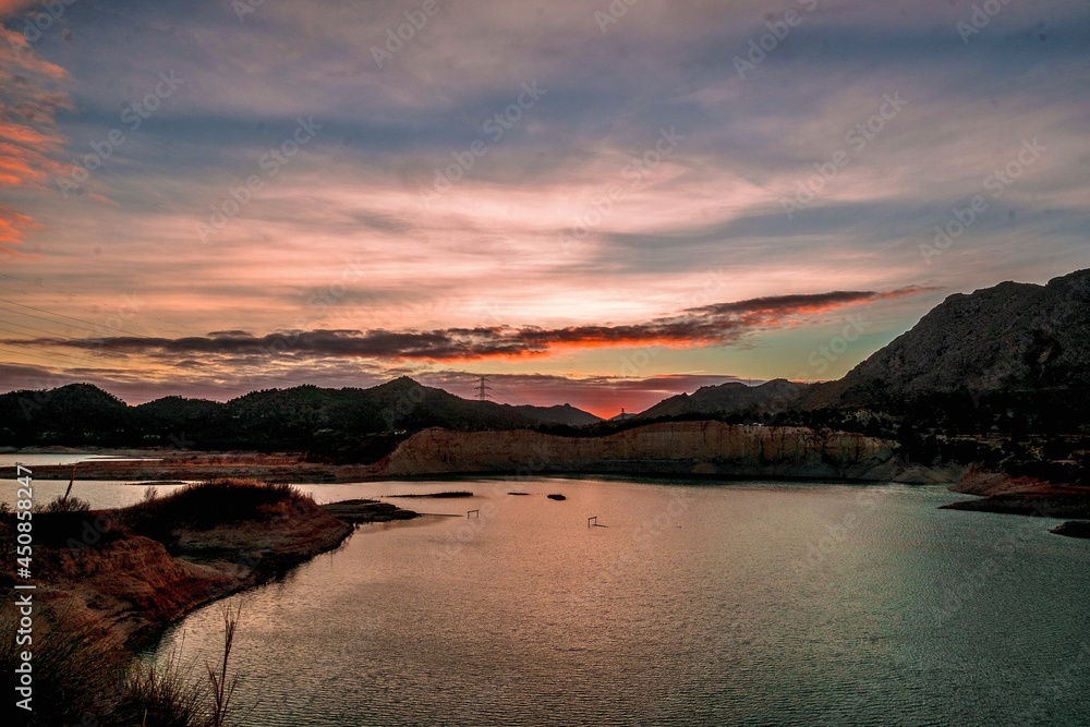 Fototapeta premium The Amadorio reservoir, near Alicante in Spain, at sunset