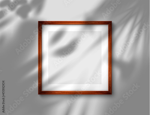 Realistic brown picture frame with blank pano for your design. Frame with overlay tropical shadow from the window. Vector illustration Ai 10, Eps 10 and Jpeg