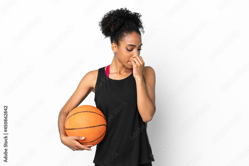 Young basketball player latin woman isolated on white background having doubts