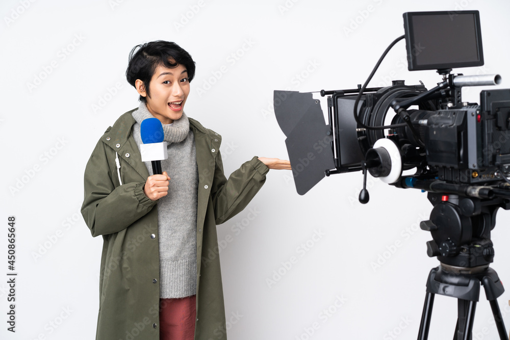 Reporter Vietnamese woman holding a microphone and reporting news with shocked facial expression