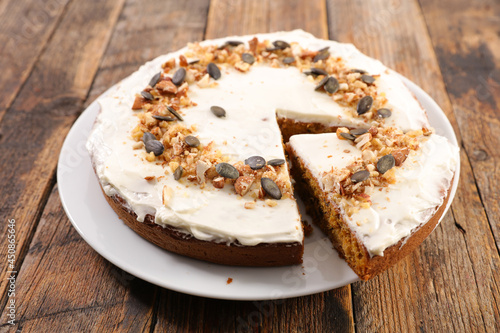 traditional carrot cake with cream and nuts