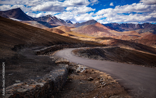 Road to the mountain with out of focus foreground, Leh, Ladakh, India