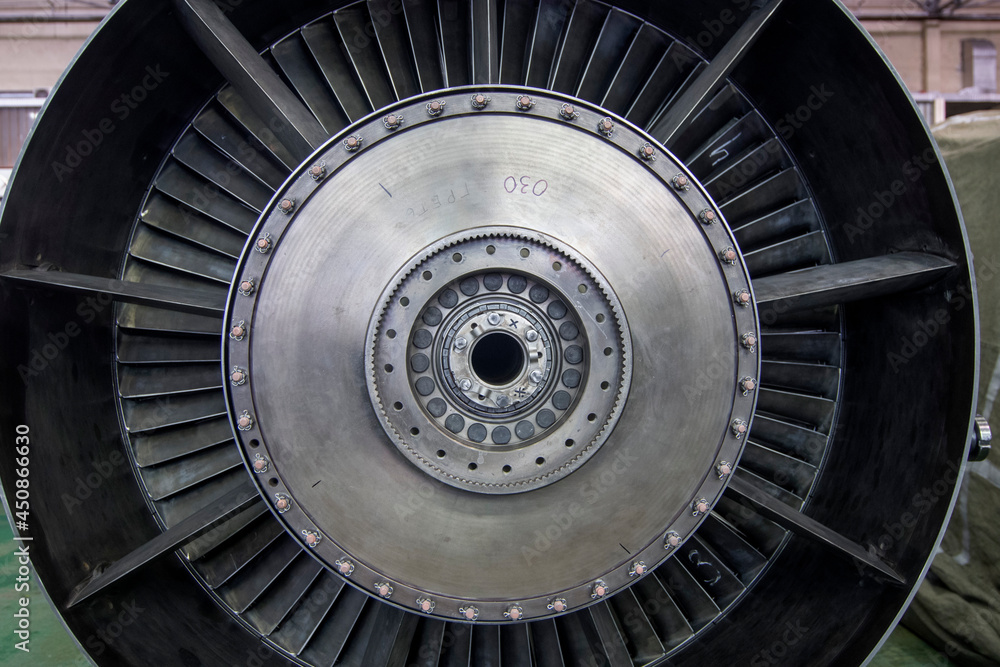 The blades of a gas turbine engine at the factory in the process of its creation, detail. The blades of a gas turbine engine at the factory in the process of its creation, detail.