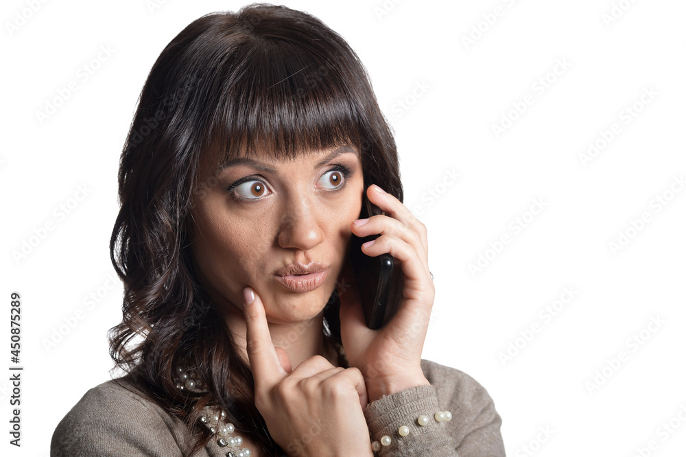 Portrait of beautiful young woman talking on phone Portrait of beautiful young woman talking on phone