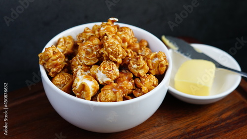 Closeup of caramel popcorn in ceramic bowl