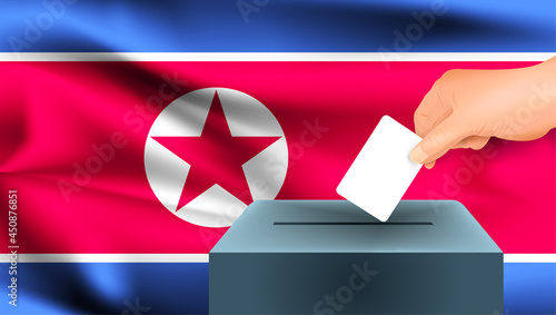 North Korea flag, male hand voting with North Korea flag concept idea background