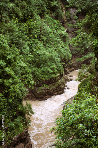 Autumn. Rough river in the mountains.